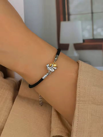 Harper – Black Cord Dog Embrace Bracelet (Silver & Gold Charm)